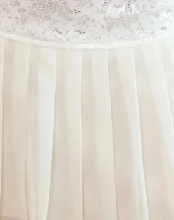 Akara Pleated Mini Skirt in Chiffon Ivory