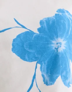 Balia Asymmetric Short Sleeve Top in Off White with Blue Flower Silhouette