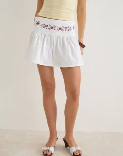 Becita Mini Skirt in Poplin White with Cherry Blossom Embroidery