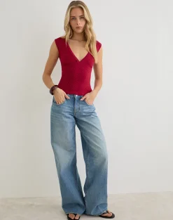 Emberly Plunge Top in Red with Micro Polka Black