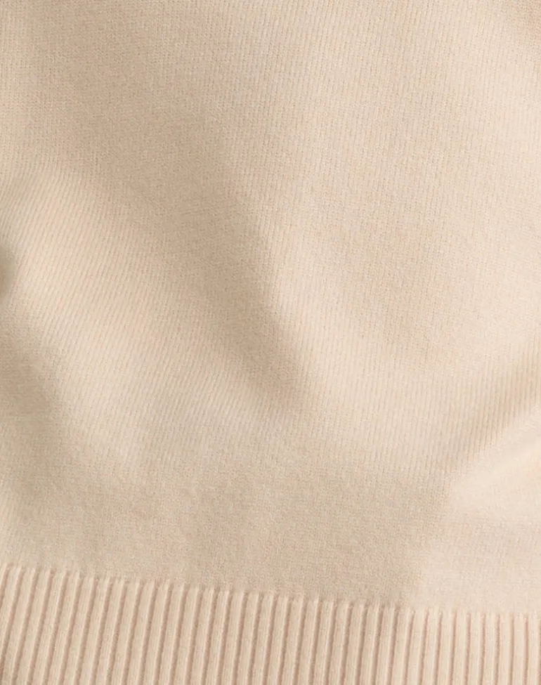 Jalira Asymmetric Jumper in Cream