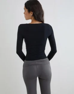Kalais Long Sleeve Twisted Neckline Top in Black