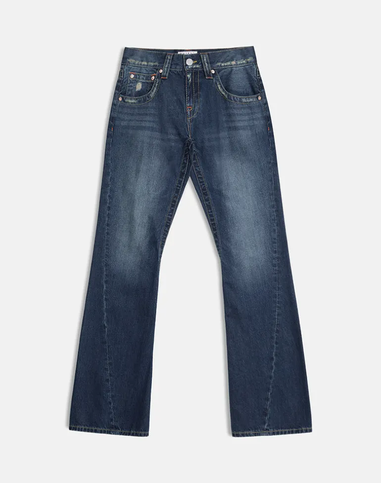 Low Rise Twisted Seam Jeans In Mid Blue Tint