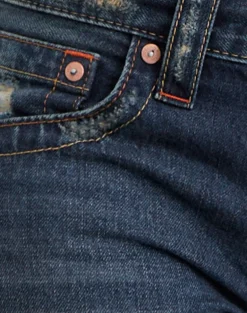 Low Rise Twisted Seam Jeans In Mid Blue Tint