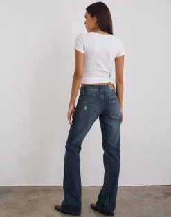 Low Rise Twisted Seam Jeans In Mid Blue Tint