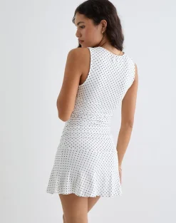 Luscian Plunge Mini Dress in White with Micro Polka Black