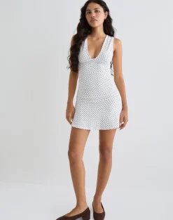 Luscian Plunge Mini Dress in White with Micro Polka Black