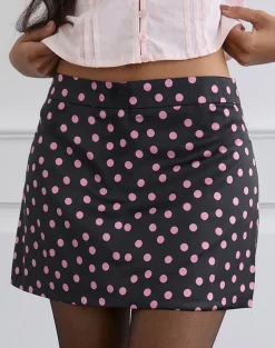Maula Mini Skirt in Black Satin Scattered with Pink Polka