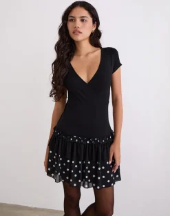 Navya Wrap Mini Dress in Polka Black and White