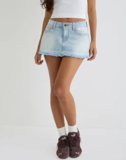 Raw Hem Low Rise Denim Mini Skirt in Icy Blue