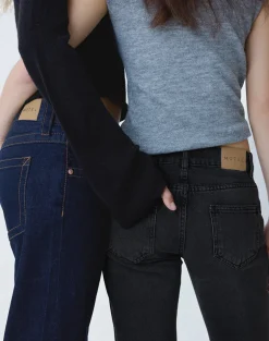 Rigid Low Rise Flare Jeans in Washed Black Grey