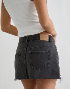 Ripped Raw Hem Denim Mini Skirt in Vintage Black