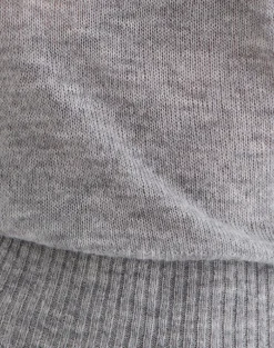 Suena Asymmetric Jumper in Grey