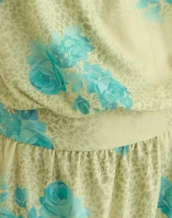 Sunyi Mini Dress in Green Blurred Jungle with Turquoise Rose