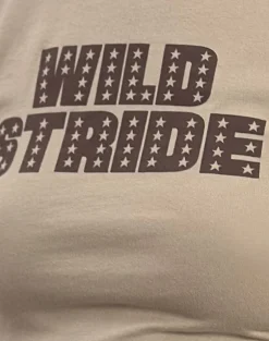 Sutin Tee in Coconut Milk with Wild Stride Graphic
