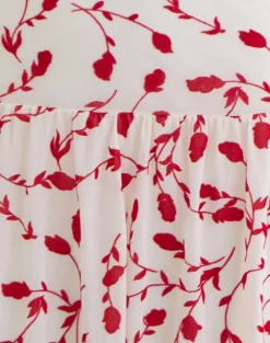 Switaria Mini Dress in Cream with Red Leafy Lily Flock