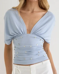 Vernia Plunge Batwing Top in Lyocell Dusty Blue with Pearl Buttons
