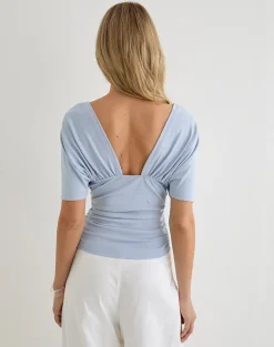 Vernia Plunge Batwing Top in Lyocell Dusty Blue with Pearl Buttons