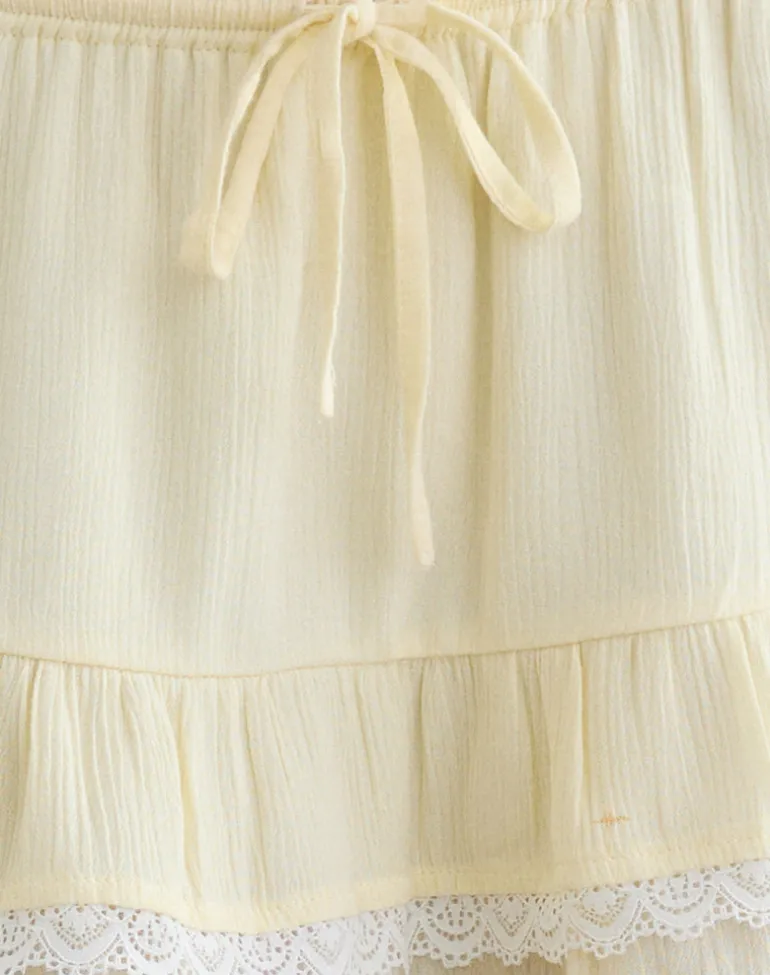 Yasu Ruffle Hem Mini Skirt in Crinkle Butter Yellow